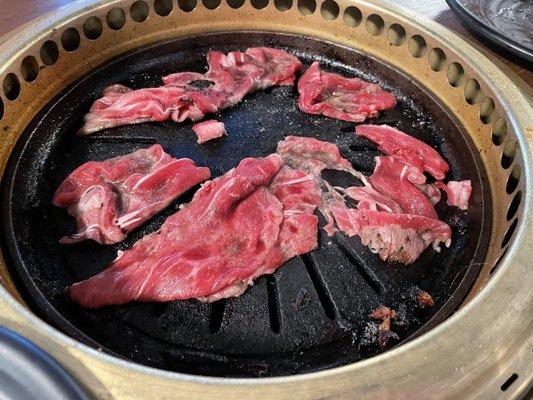 Thinly sliced ribeye, my steak, large prawns, tempura strawberries