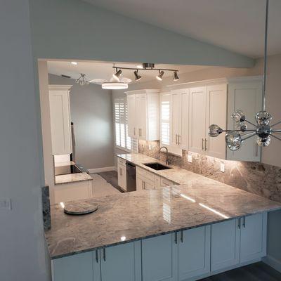 custom kitchen cabinets and tile and granite countertops