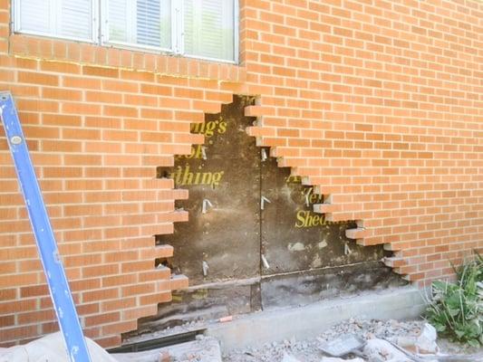 Holly St. home needed many brick replacements due to severe damage to side wall and cracks.