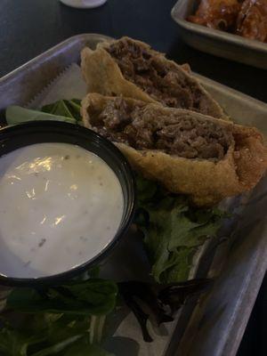 Steak and cheese egg rolls