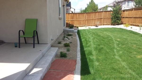 Sod installation, Concrete Curb, Arizona Flagstone, Small Perennial Plants, D.G. flower bed ground cover.