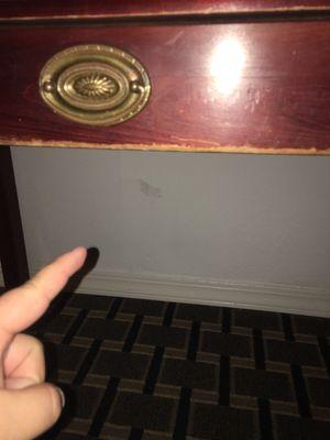 There are literal holes in the wall in our room. Not to mention the worse-than-thrift store condition of that desk drawer.