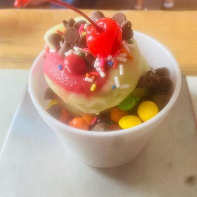 Cup of froyo with yummy toppings