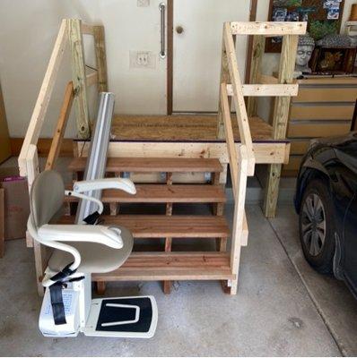 Efficient garage stairlift installation ensuring safe & easy access to upper levels--maximize space without sacrificing mobility.