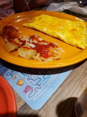 Egg and cheese omelet with home fries kids size.