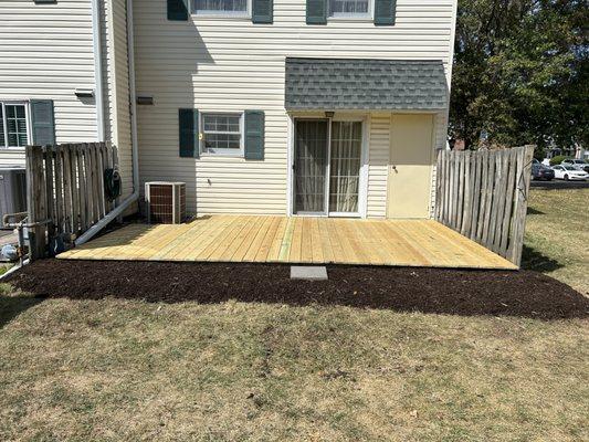 Deck completed with flowerbed