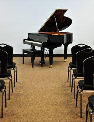 Baby grand piano at Northwest School of Music recital hall.