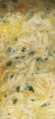 a closeup of their frozen lemon orzo soup after heating it up