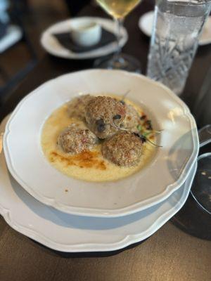 Meatballs appetizer in white cream sauce