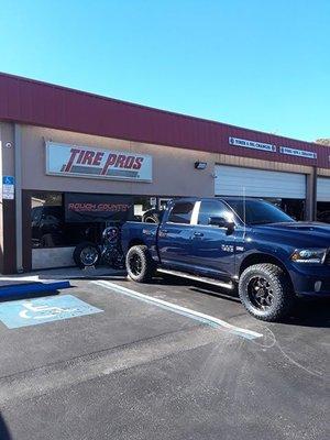 Another happy customer  with a rough country 4 inch lift kit with a rims and tire package  installed