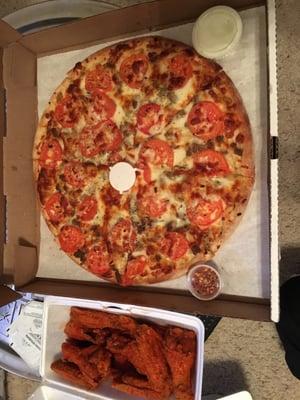 Large white pizza with sausage & hot buffalo wings!