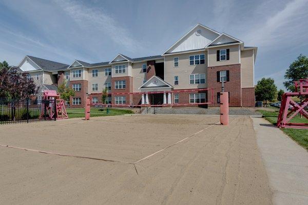 Full sized sand volleyball court that is free for residents and their friends to use!