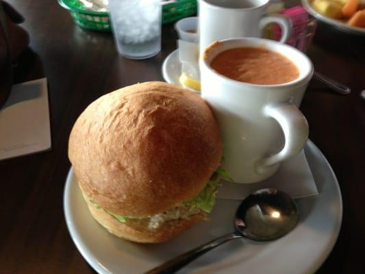 Chicken salad sandwich and cup of tomato soup