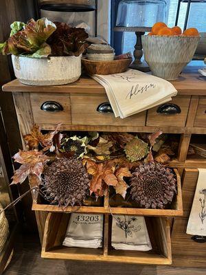 Faux sun flowers and fall leaves, dining and entertaining bowls