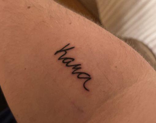 My tattoo (my wife's name in her handwriting)