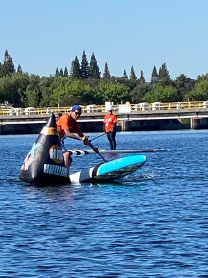 Me racing SUP recently in Sacramento