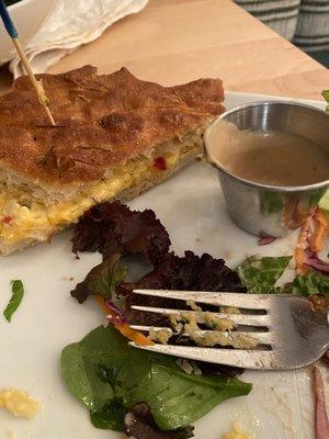 Grilled Pimento Cheese on sourdough with a side salad.