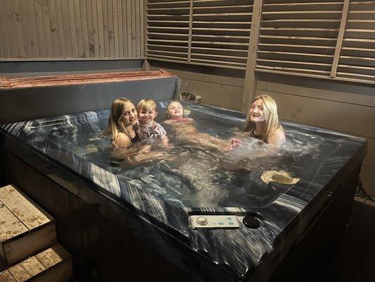 Hot tub fun in our honey bear hollow cabin.