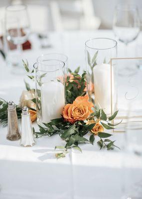 simple centerpieces and hurricane candles