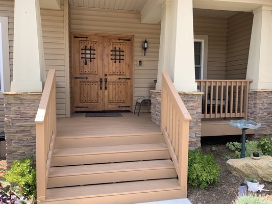 Deck power washed, sanded and refinished.