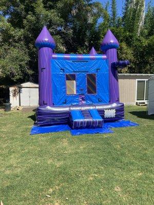 Our new 13x13 bounce castle with a basketball hoop