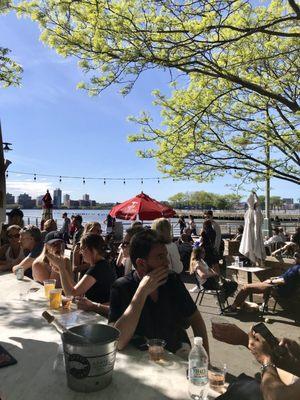 Outdoor waterfront seating on the Hudson