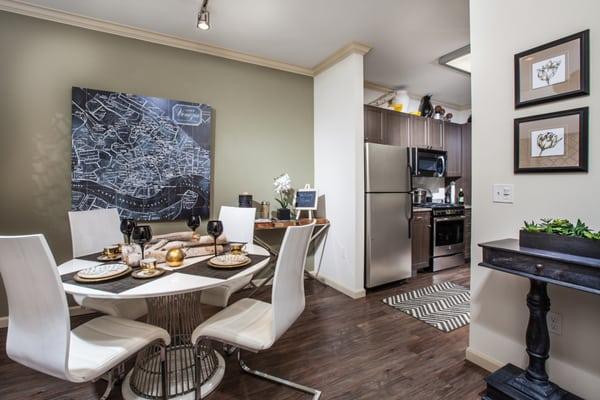 Formal dining space, plus eat-in kitchen breakfast bar at The Verdant Apartments in San Jose, CA