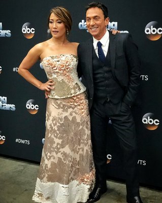 Carrie Ann Inaba wearing Mila Fashion golden gown during Dancing with The Stars red carpet portion of November 6th show.