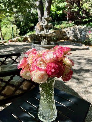 Our $40 antique hand cut crystal vase with some roses from our gardens.  This rose is called 'Cherry Parfait'.