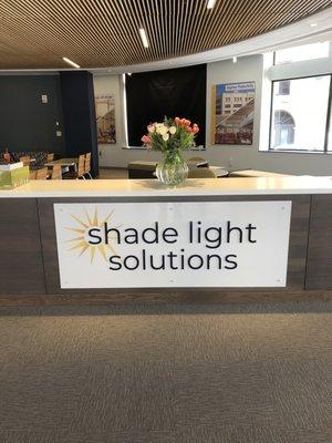 Shade Light Solutions lobby sign