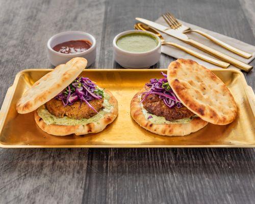 Juicy minced patty served with red cabbage, mayonnaise and mint cilantro sauce.