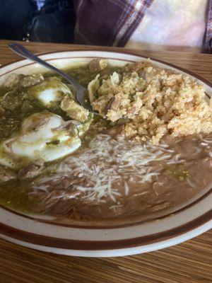 Huevos Rancheros w/Chile Verde, eggs over easy . Flour tortillas and their fresh squeezed orange juice (not pictured).