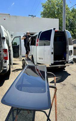 Both of the rear quarter glasses were  smashed on this Chevrolet Express. These quarter glasses are over five feet long and laminated glass!