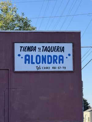 Alondra Tienda y Taqueria sign with telephone number