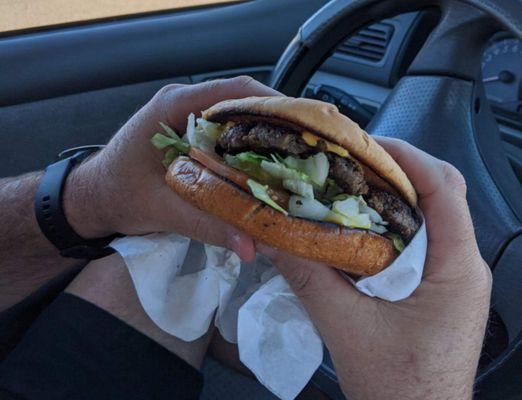 Single cheese burger all the way with mustard!