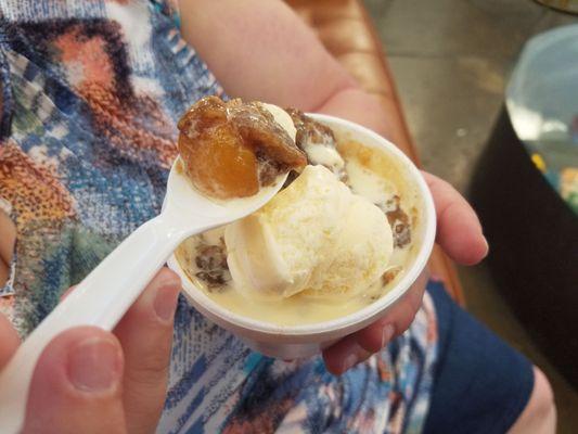 Peach cobbler and vanilla ice cream.