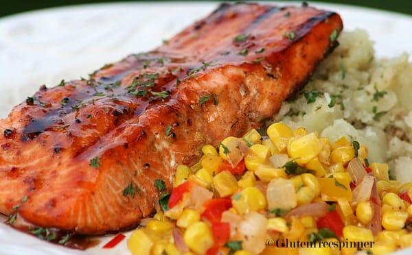 BBQ Salmon on a bed of rice pilaf aside of corn salsa ...