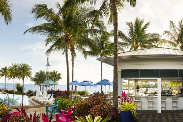 Open air bar with tvs and water views