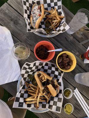 Two Brisket Philly Cheesesteaks (top no onion straws), side of brisket, Chili and a Avery Maharaja IPA.