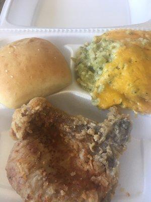 Lunch options Pork Chop, broccoli rice casserole and a yeast roll