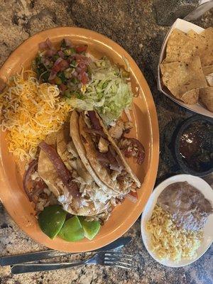 Three fish tacos in crunchy corn taco shells