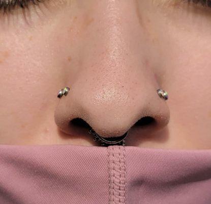 Nostril piercings by Cassie.