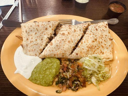 Steak, chicken quesadilla add onions and peppers