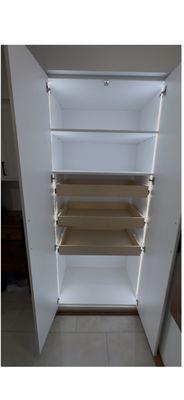 Integrated dimmable LED strip lighting in a pantry cabinet