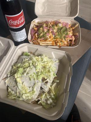 Personalized super fries with shrimp and carnitas quesadilla with beans. Imported Coca-Cola, half liter