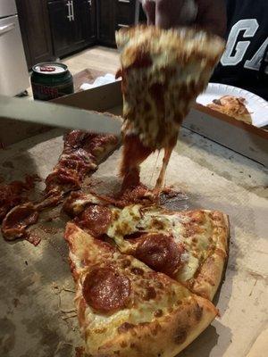 Soggy slice of pizza.