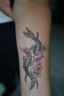 Koi fish tattoo with cherry blossoms. Fine Linework done by Eric Rodriguez @_tattoosbymonotone_