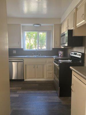 Kitchen with stainless steel appliances.