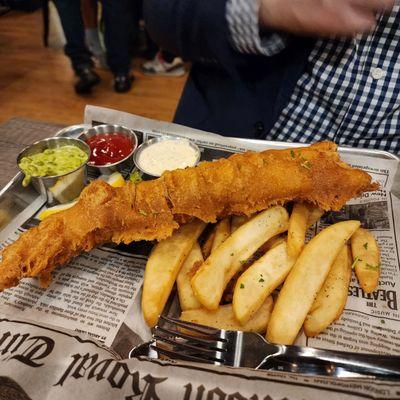 Fish and chips. Fresh fish, light and super crispy batter. Mushy peas and curry tartar as sides.