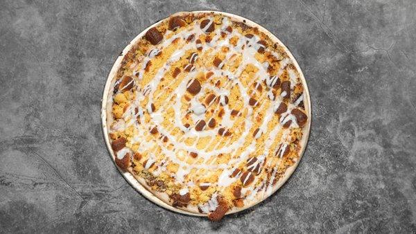 Indulge your sweet tooth with our s'mores dessert pizza!  A delicious twist on a campfire classic